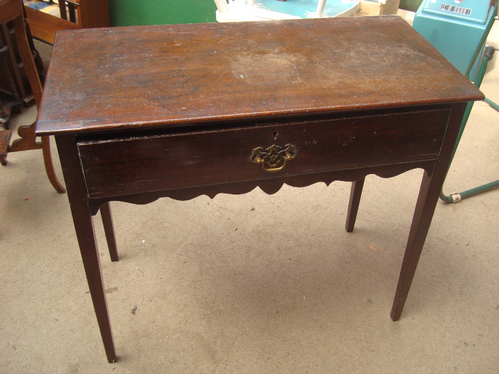 A 19th Century side table.