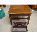 A low mahogany table with a 19th Century cutlery carrier.