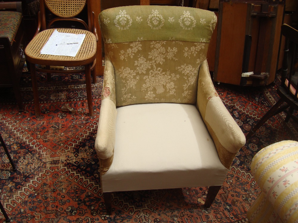 An Edwardian upholstered armchair, a/f.