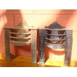 Two cast iron fire baskets.