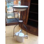 An enamel washstand with enamel water can (2).