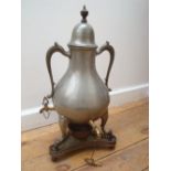 A poss Dutch baluster form pewter 3 tap samovar on pierced brass stand.