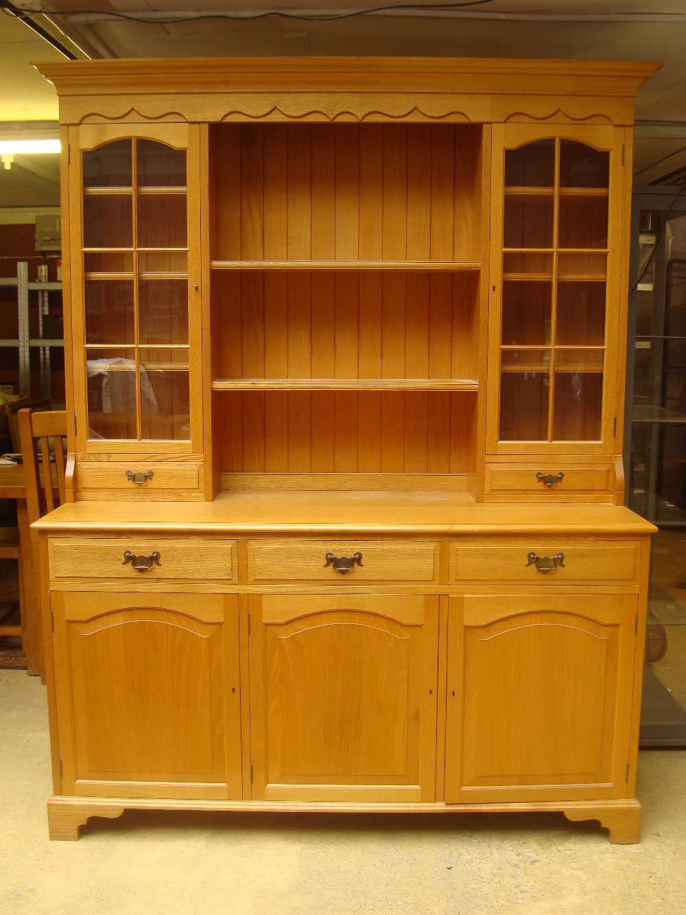 A 20th Century chestnut dresser, made by ER Truphet & Sons, 1997 with original bill.