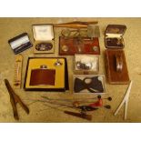 Desk postal scales, a leather desk blotter, glove stretchers, hat pins, hip flask, cufflinks etc.