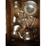 A silver tea pot, sugar bowl, a bowl, spoons, two milk jugs, napkin rings (Qty).