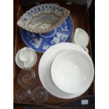 A blue and white wall plate, a pierced floral design ceramic basket,