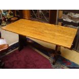 A reproduction Queen Anne style oak side table, the three plank top above a frieze drawer,