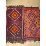 2 modern Afghan rugs,measuring 92 x 215cm and 97 x 203cm.