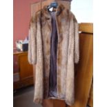A 1950's / 1960's full length mink coat (relined).