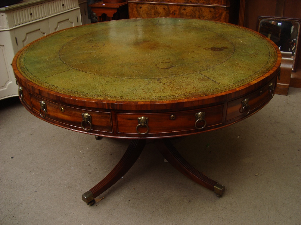 A 19th Century circular drum centre table,