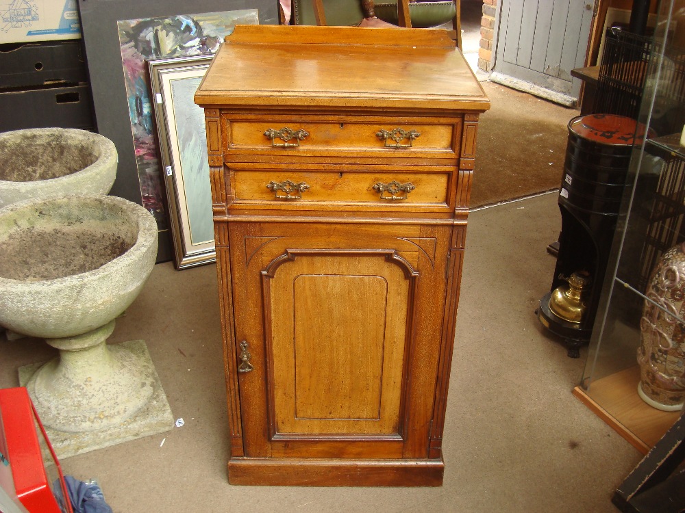 A late 19th/early 20th Century cupboard with two drawers. 54 x 36 x 100cm.