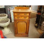 A late 19th/early 20th Century cupboard with two drawers. 54 x 36 x 100cm.