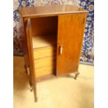 A 1940s oak lowboy, with three drawers to interior.