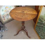 A early 19th Century provincial tilt top tripod table.