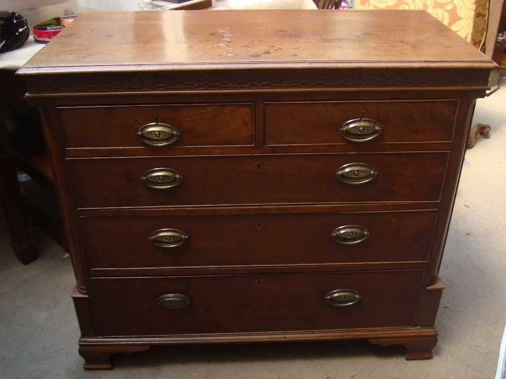 A George III mahogany chest of drawers,