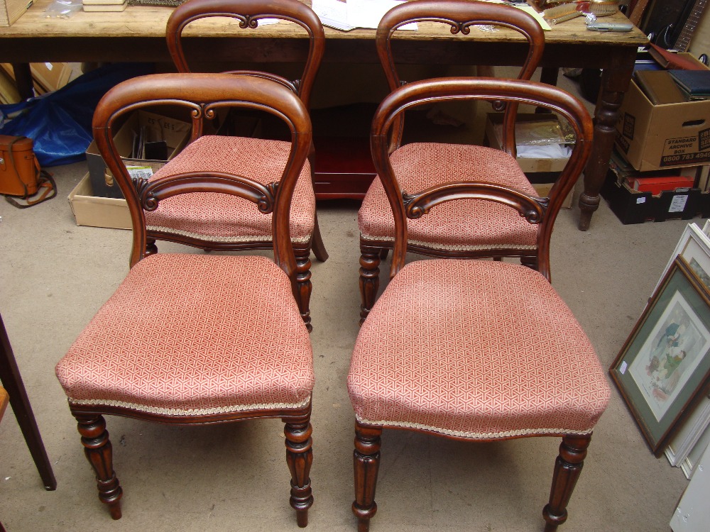 Three mid 19th Century spoonback dining chairs with stuffover seats and another with similar