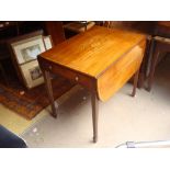 A George III mahogany Pembroke table, the top with moulded edge,