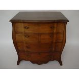 A George III style bombe shaped secretaire chest of drawers,
