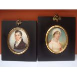 A poss pair of early 19th Century portrait miniatures on ivory, in later frames.