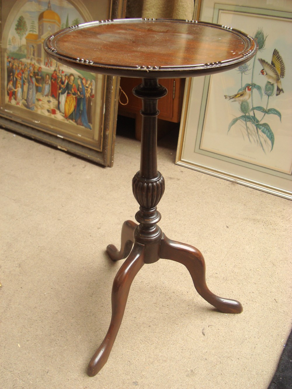 A 20th Century mahogany wine table.