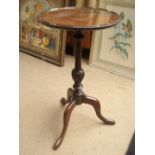 A 20th Century mahogany wine table.