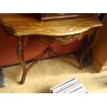 A pair of French console tables.