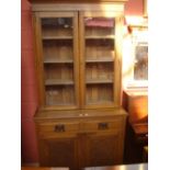 An Edwardian oak bookcase.