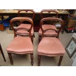 Three mid 19th Century spoonback dining chairs with stuffover seats and another with similar