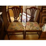 Two early 19th Century splat back chairs with tapestry drop in seats.