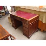 A mid 20th Century twin pedestal desk with inset leather top. 123 x 62cm.