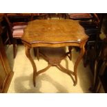 An Edwardian rosewood occasional table.