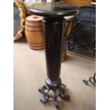 A 19th Century jardiniere stand on wrought iron feet.