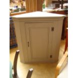 A large pine grey painted corner cabinet.