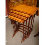 A burr walnut and mahogany 20th Century quartetto nest of tables.