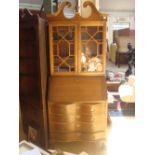 A reproduction 18th Century American style mahogany bureau bookcase by Maddox of Jamestown New York.