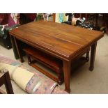 An African hardwood dining table on square legs with spade feet. 150 x 90cm.