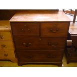 A 19th Century oak chest of drawers, two deep short over two long raised on bracket feet.