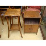 A plant stand together with a side cupboard.