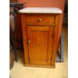 A pine pot cupboard with marble top.