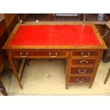 A 19th Century Edwardian inlaid single pedestal desk.