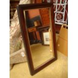 A 19th Century rectangular wall mirror.