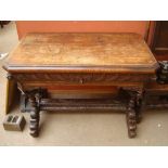 A heavily carved 19th Century oak rectangular table.