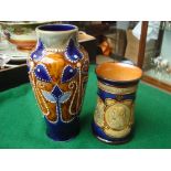 A Doulton vase, incised monogram F.A.B (Frank Butler) with a Doulton Nelson spill vase.