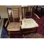 A late 19th Century bobbin turned open elbow chair,