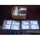 A box containing albums of various stamps.