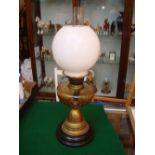A late Victorian Veritas brass oil lamp,