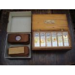 A late 19th Century wooden case of microscopic slides relating to cats, dogs and other animals,