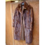 A long mink coat.