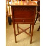 A late 19th Century mahogany sewing box/night table with swivel top.