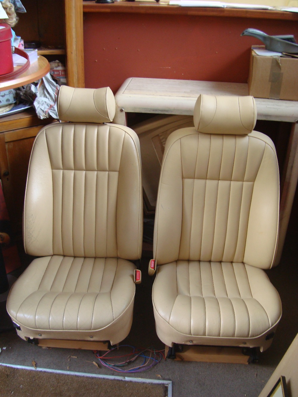 Two leather upholstered Jaguar seats.